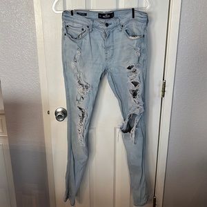 Hollister men’s stacked skinny light wash extremely distressed jeans